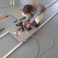 Fixing the camera on the moveable platform in a shoe testing center